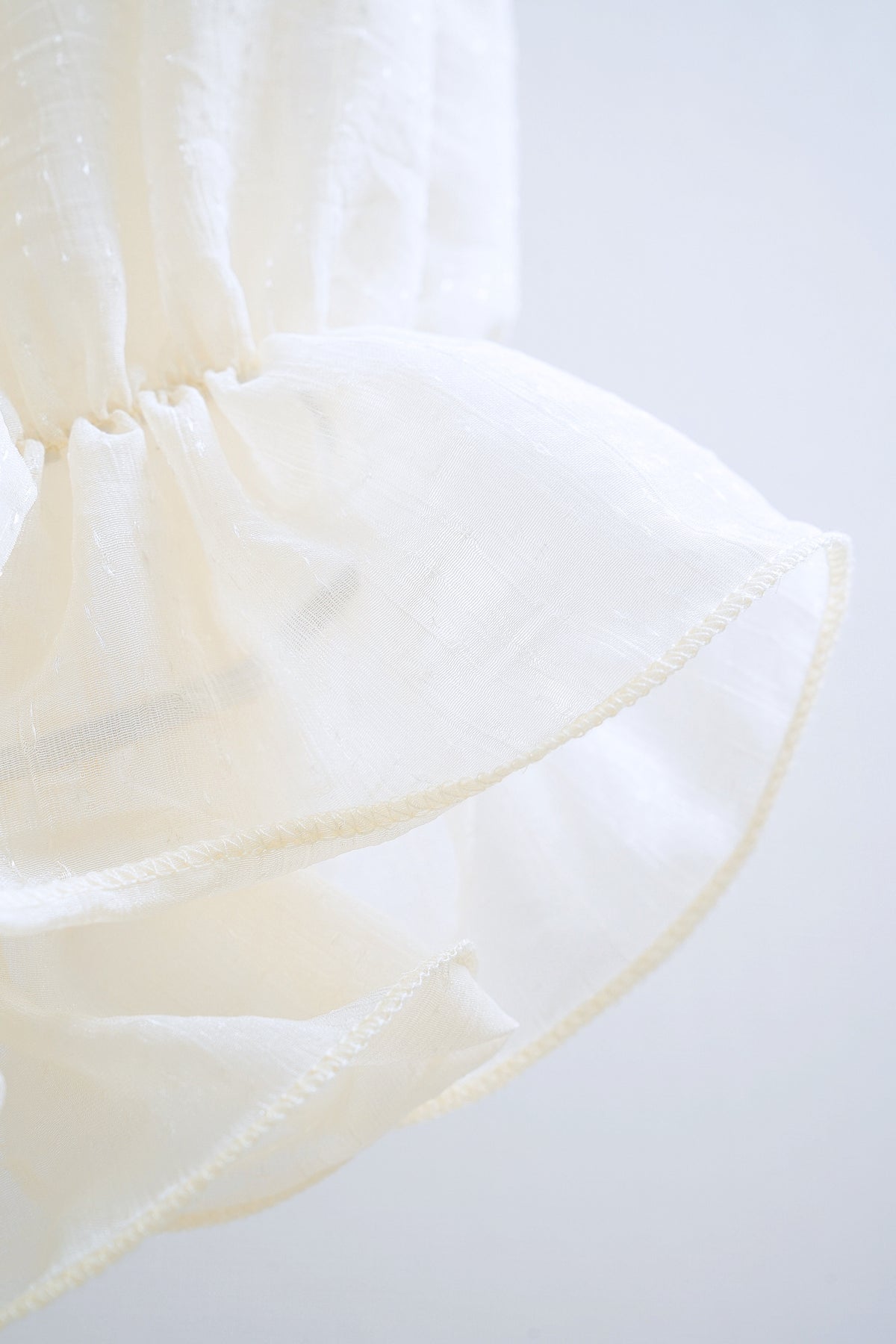 Ivory Sheer Organza Ruffled High-Neck Blouse
