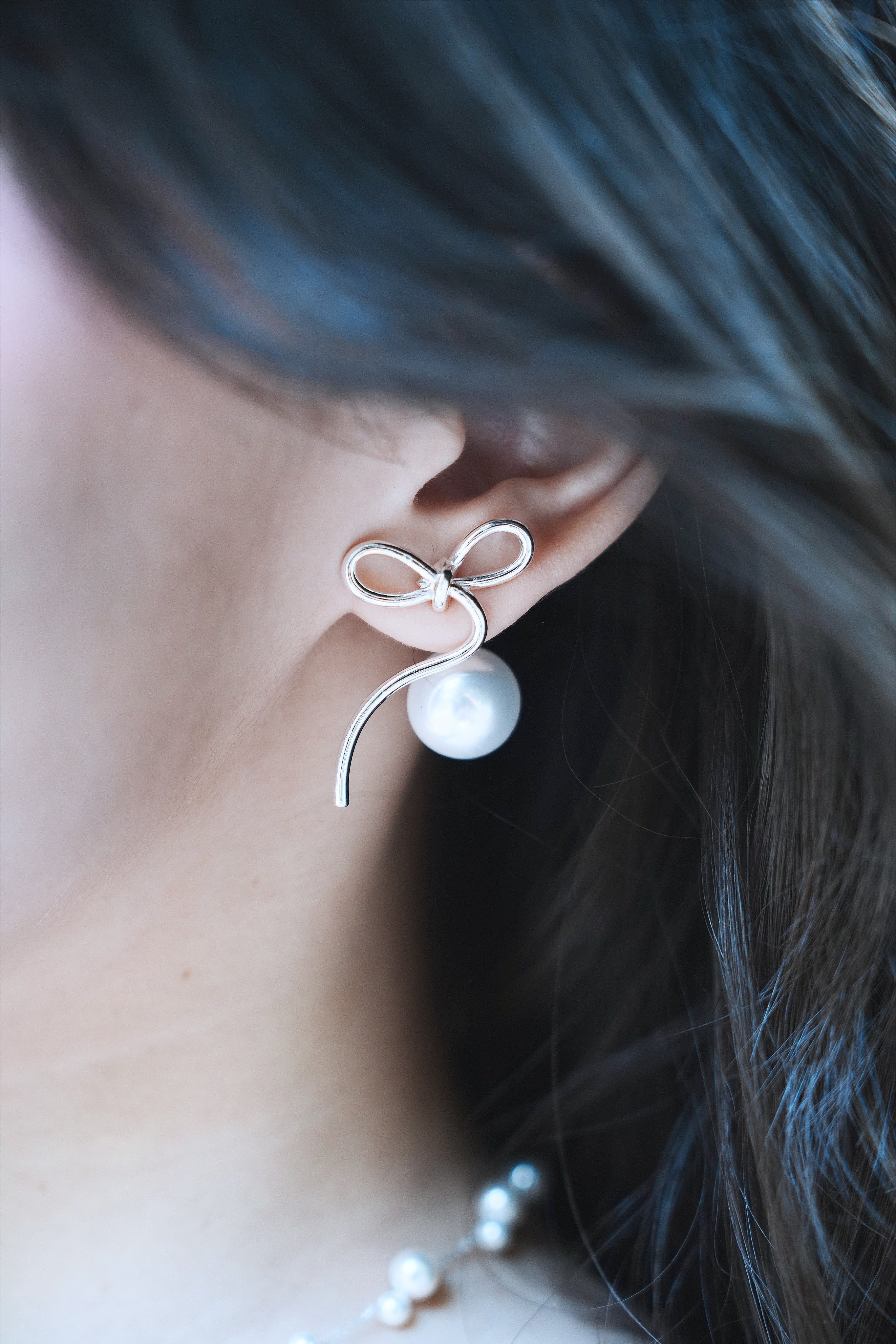 Ribbon pearl earring