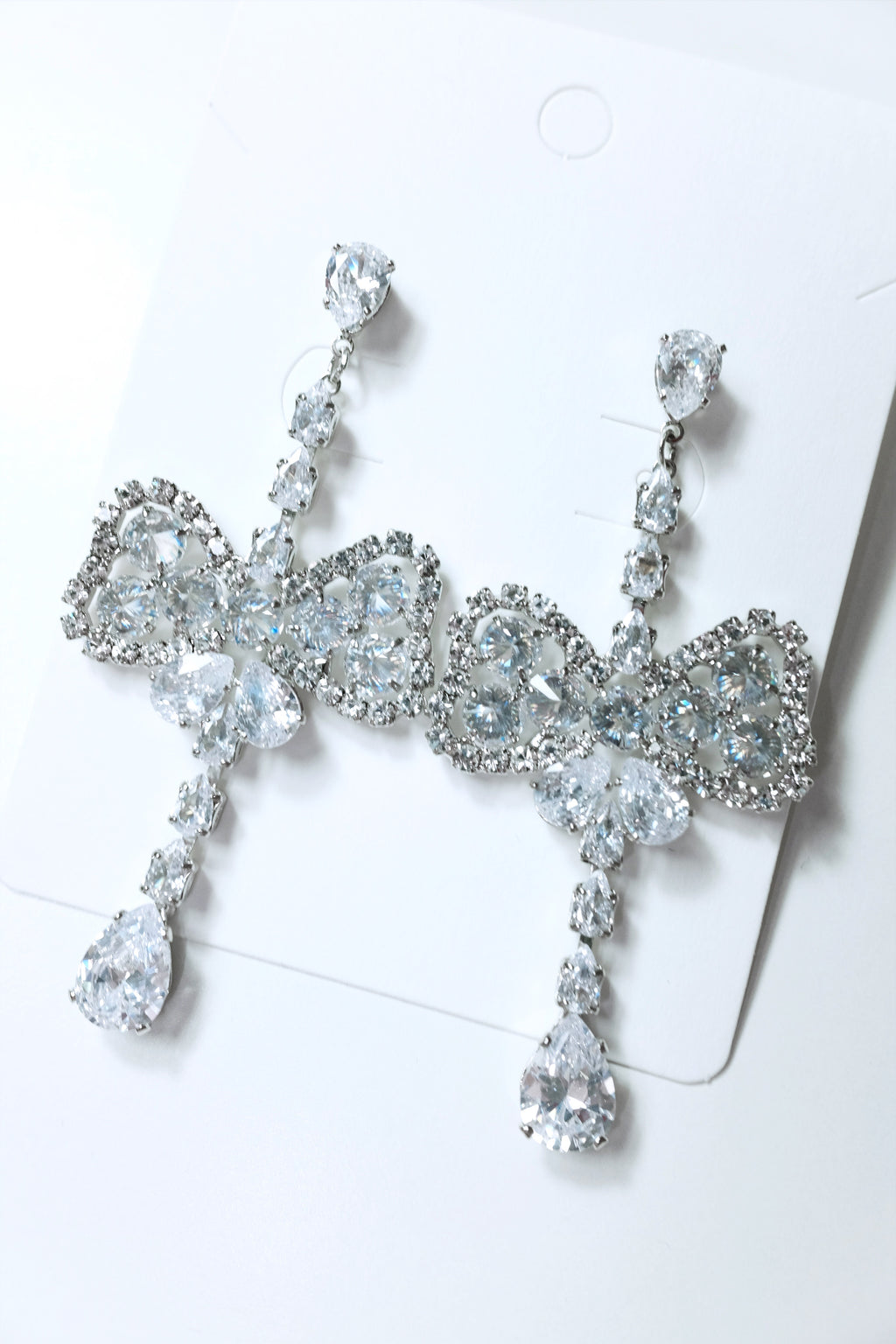 Silver Oversized Diamond Ribbon Drop Earrings