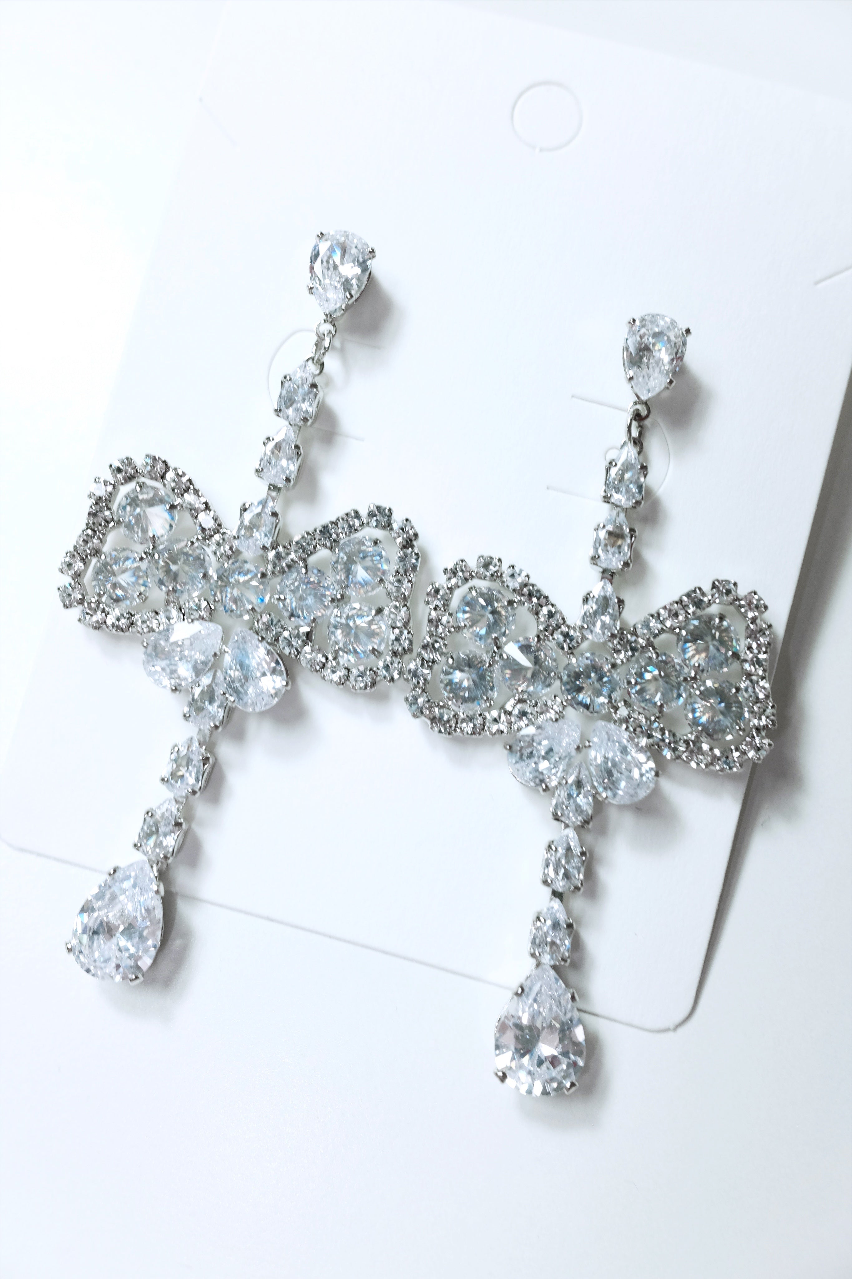 Silver Oversized Diamond Ribbon Drop Earrings