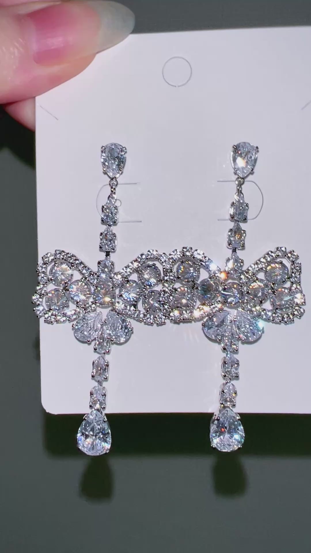 Silver Oversized Diamond Ribbon Drop Earrings